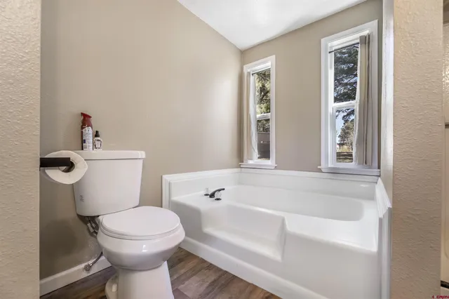 a bathroom with a sink and toilet
