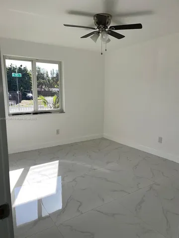 a view of a window in an empty room