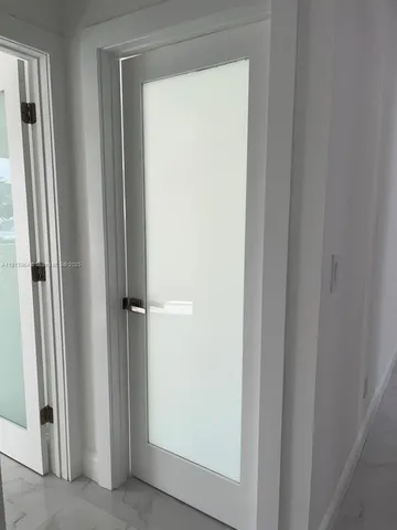 a view of a swimming pool with a yard