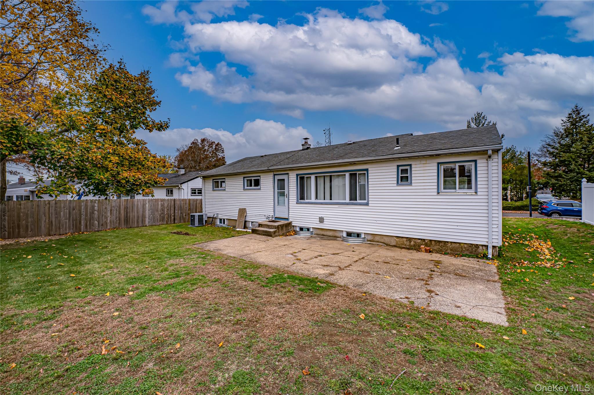 10 Gerhard Road Plainview, NY 11803 - Photo 12 of 13 a view of a house with backyard and trees