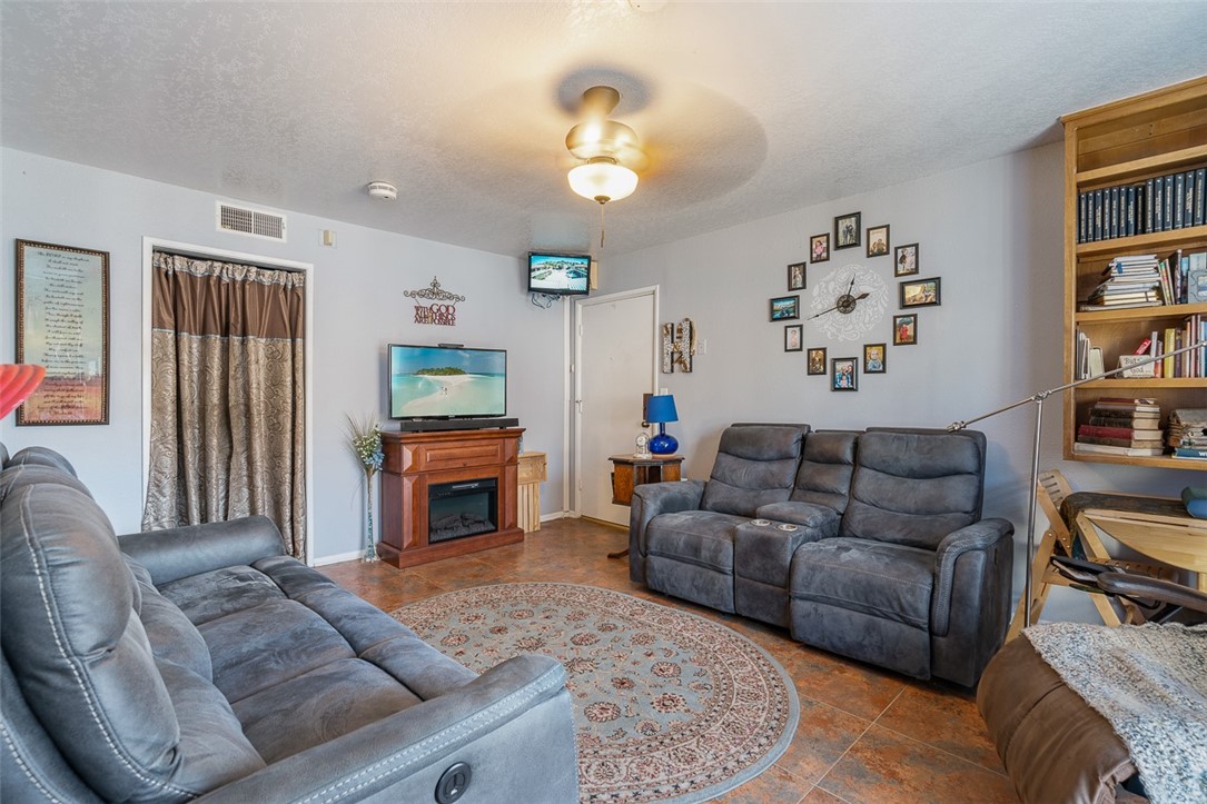 6079 La Prada Los Angeles, CA 90042 - Photo 11 of 32 a living room with furniture and a fireplace