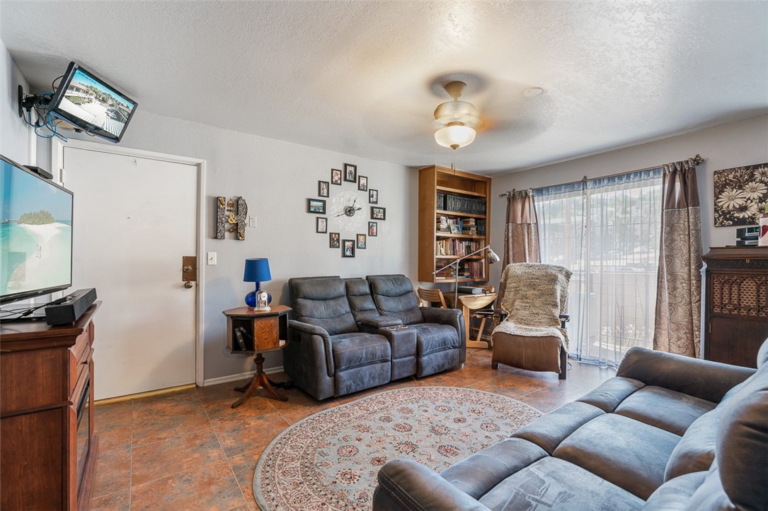 6079 La Prada Los Angeles, CA 90042 - Photo 21 of 32 a living room with furniture a large window and a flat screen tv