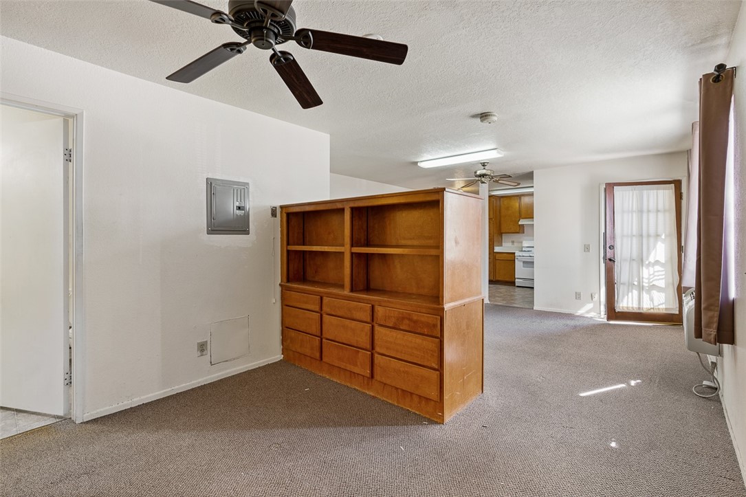 6079 La Prada Los Angeles, CA 90042 - Photo 25 of 32 a view of a room with cabinet ceiling fan and windows