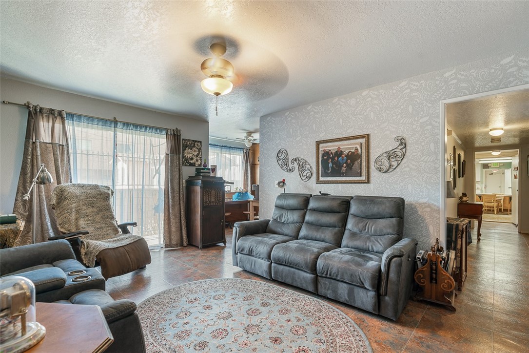 6079 La Prada Los Angeles, CA 90042 - Photo 10 of 32 a living room with furniture and a chandelier