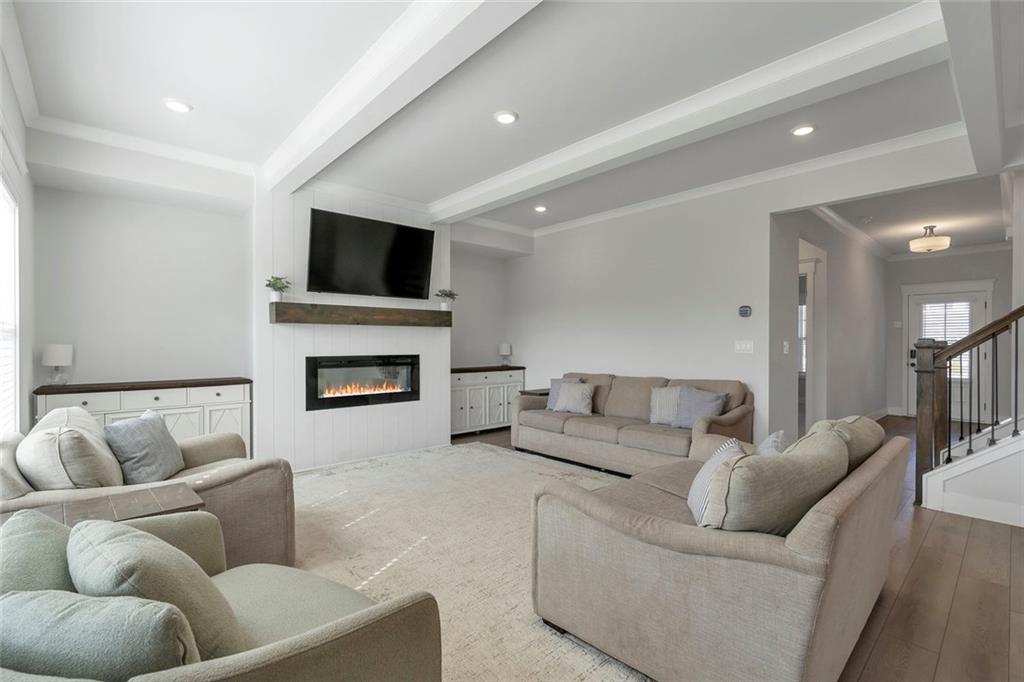 5316 Milford Road Gainesville, GA 30507 - Photo 14 of 44 a living room with furniture and a flat screen tv
