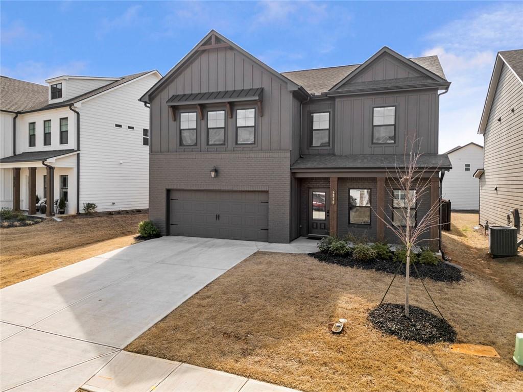 5316 Milford Road Gainesville, GA 30507 - Photo 2 of 44 a front view of a house with garden