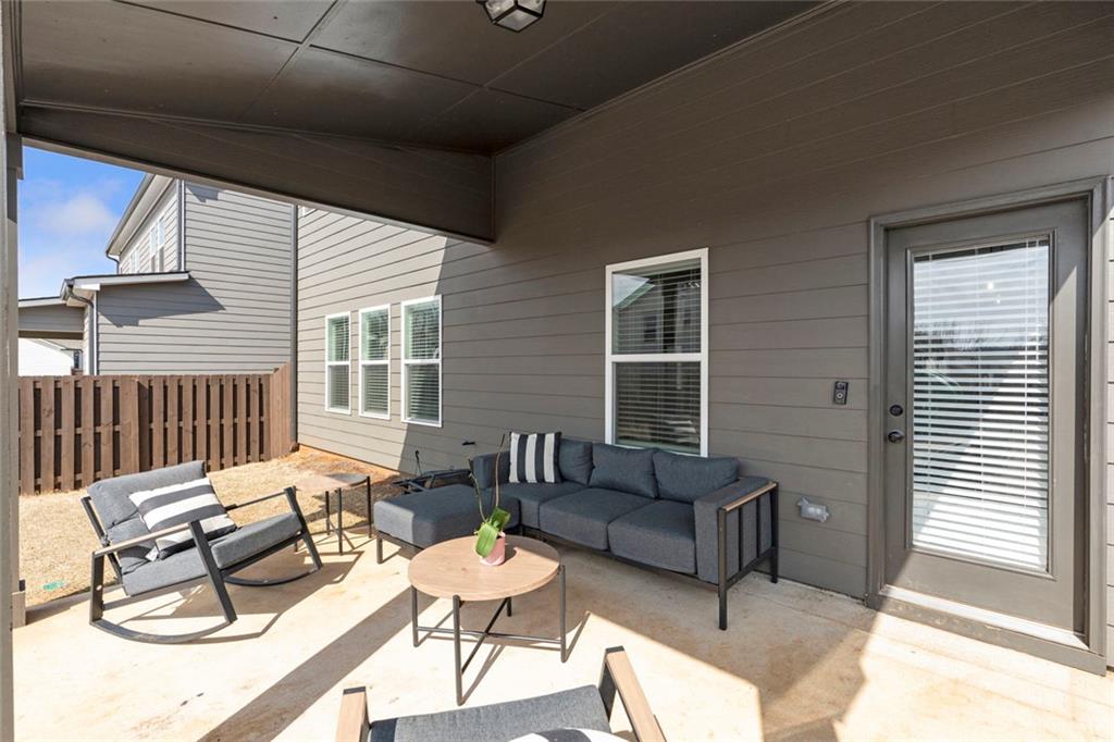 5316 Milford Road Gainesville, GA 30507 - Photo 23 of 44 a outdoor living space with furniture and a window