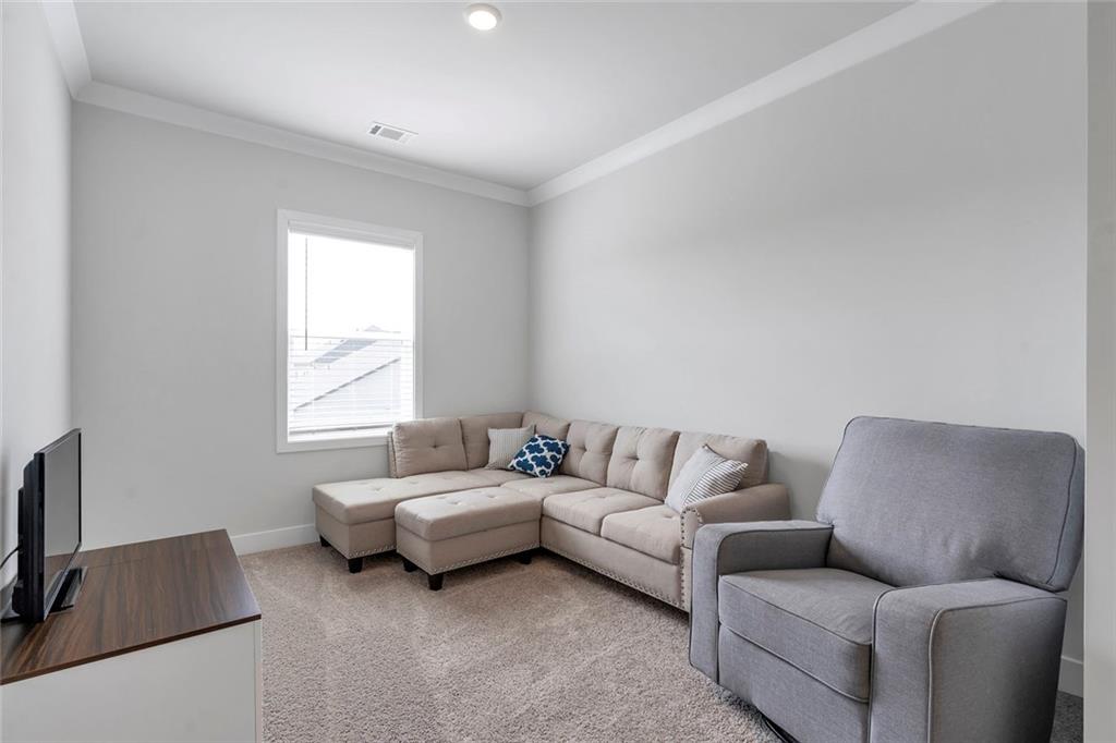 5316 Milford Road Gainesville, GA 30507 - Photo 36 of 44 a living room with furniture and a window