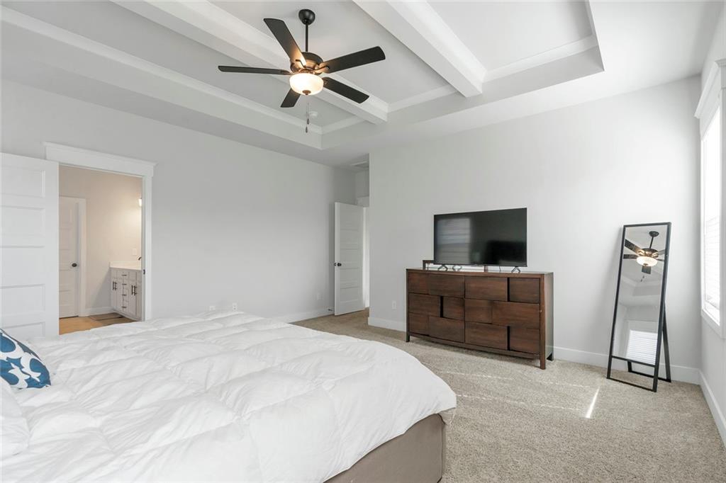 5316 Milford Road Gainesville, GA 30507 - Photo 39 of 44 a bedroom with a bed and a flat screen tv