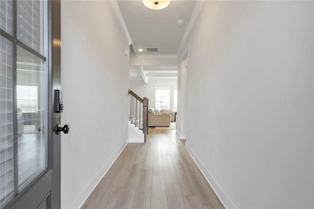 5316 Milford Road Gainesville, GA 30507 - Photo 7 of 44 a view of a hallway with wooden floor and staircase