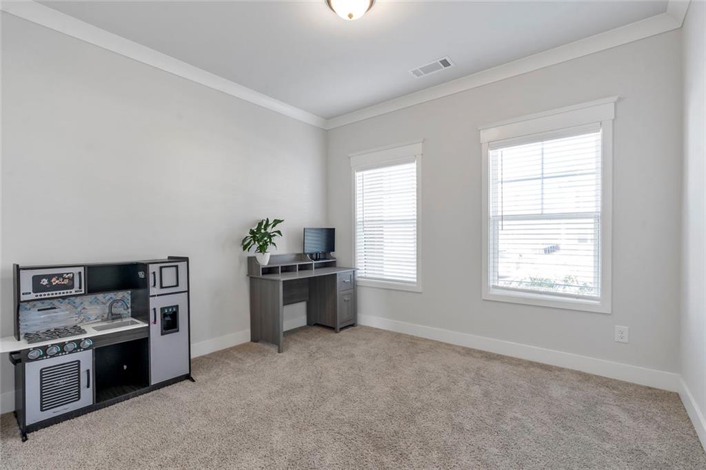 5316 Milford Road Gainesville, GA 30507 - Photo 9 of 44 a kitchen with a stove a sink and a microwave
