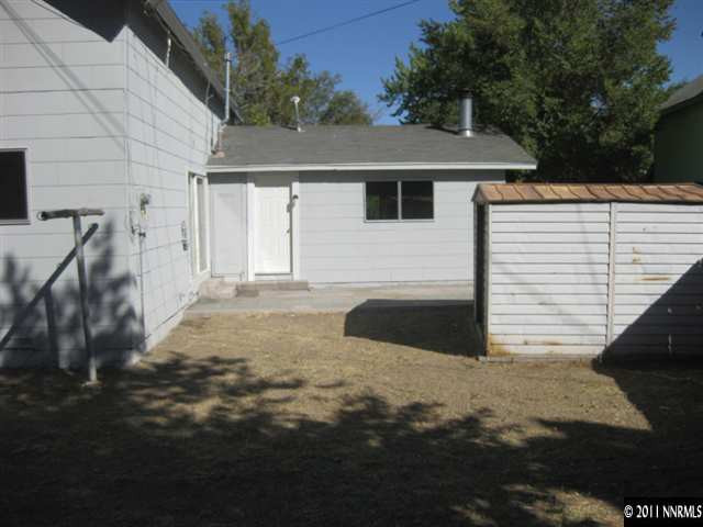 1185 Monitor Drive Reno, NV 89512 - Photo 13 of 13 a view of a house with backyard and trees