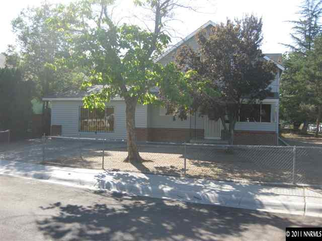 1185 Monitor Drive Reno, NV 89512 - Photo 2 of 13 a view of a tree in front of a house