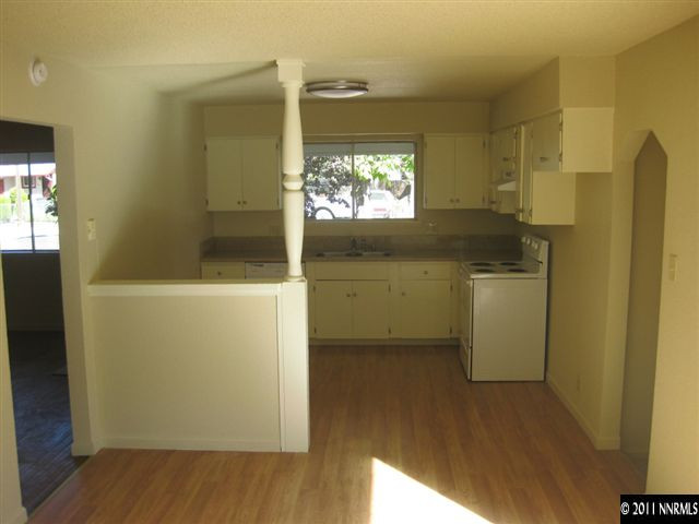 1185 Monitor Drive Reno, NV 89512 - Photo 5 of 13 a utility room with cabinets washer and dryer