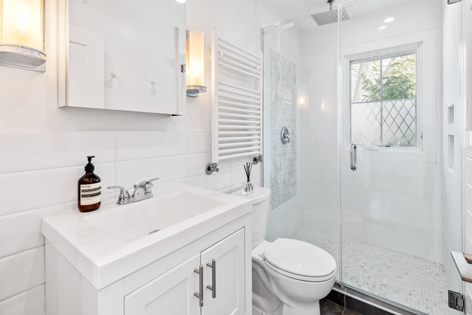 778 Bridgehampton Sag Harbor Bridgehampton, NY 11932 - Photo 13 of 18 a bathroom with a sink toilet and shower