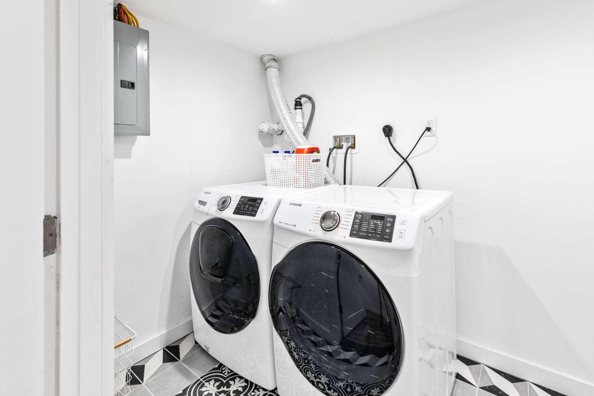 778 Bridgehampton Sag Harbor Bridgehampton, NY 11932 - Photo 18 of 18 a utility room with dryer and washer