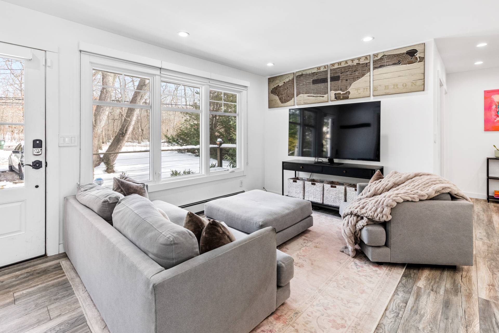 778 Bridgehampton Sag Harbor Bridgehampton, NY 11932 - Photo 2 of 18 a living room with furniture and a flat screen tv