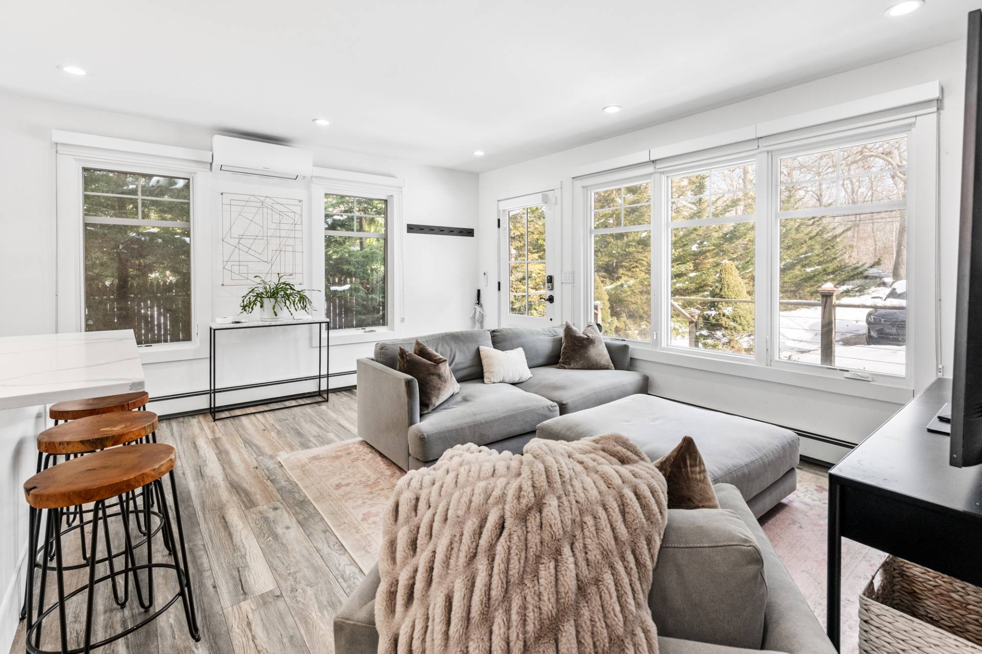 778 Bridgehampton Sag Harbor Bridgehampton, NY 11932 - Photo 3 of 18 a living room with furniture and a large window