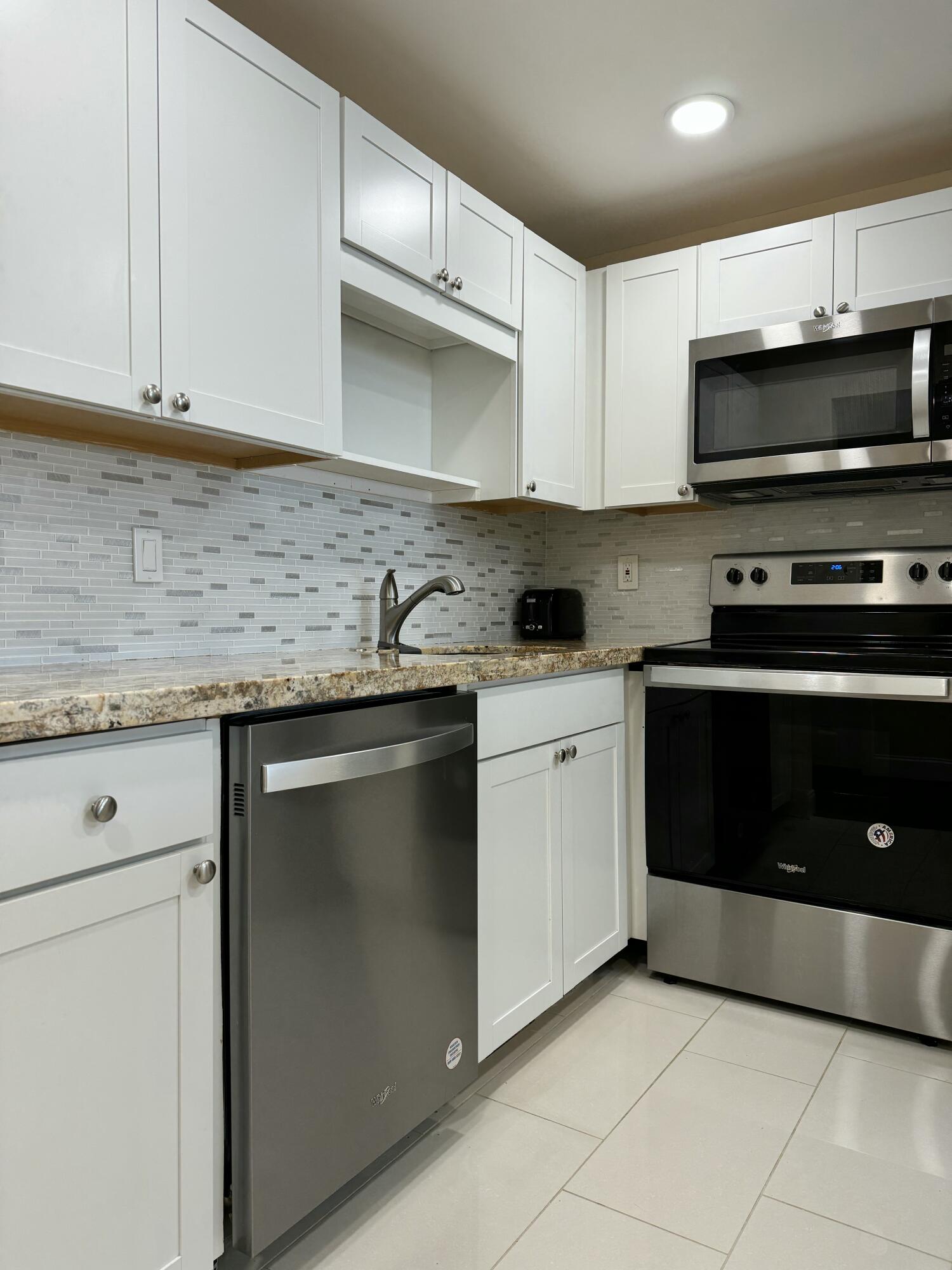 9355 Southwest 8th Street, Unit 417 Boca Raton, FL 33428 - Photo 9 of 27 IMG_9129