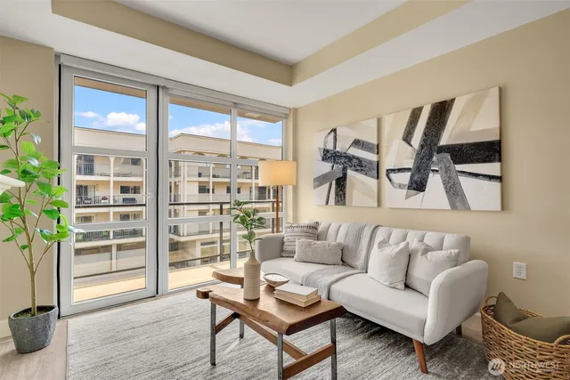 a living room with furniture and a window