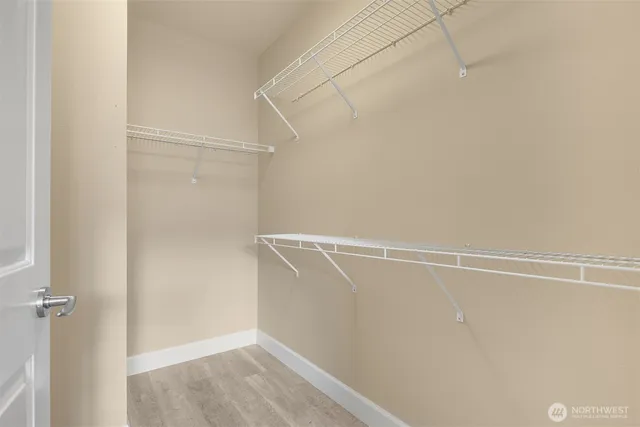 a view of a room with racks on the wall