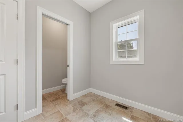 a view of a room with racks on the wall