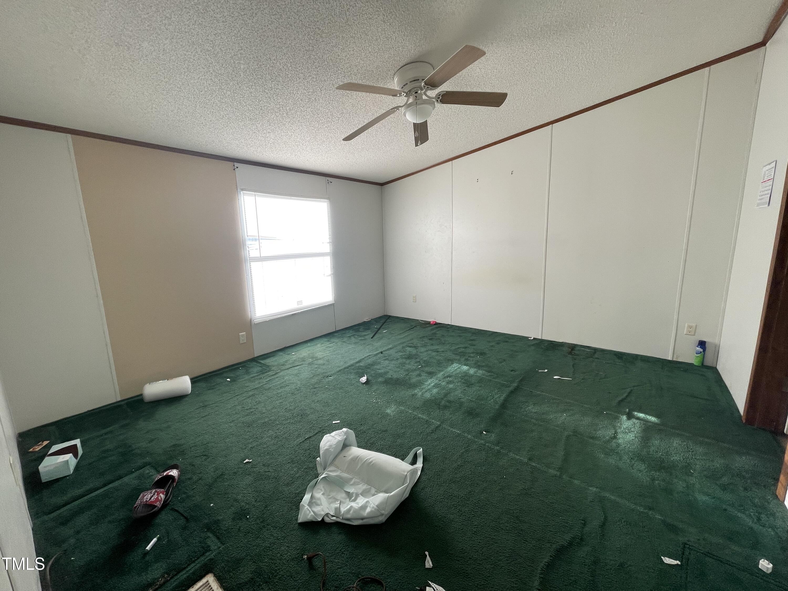 24 Christopher Way Roxboro, NC 27574 - Photo 4 of 14 a view of a room that has a fountain in it