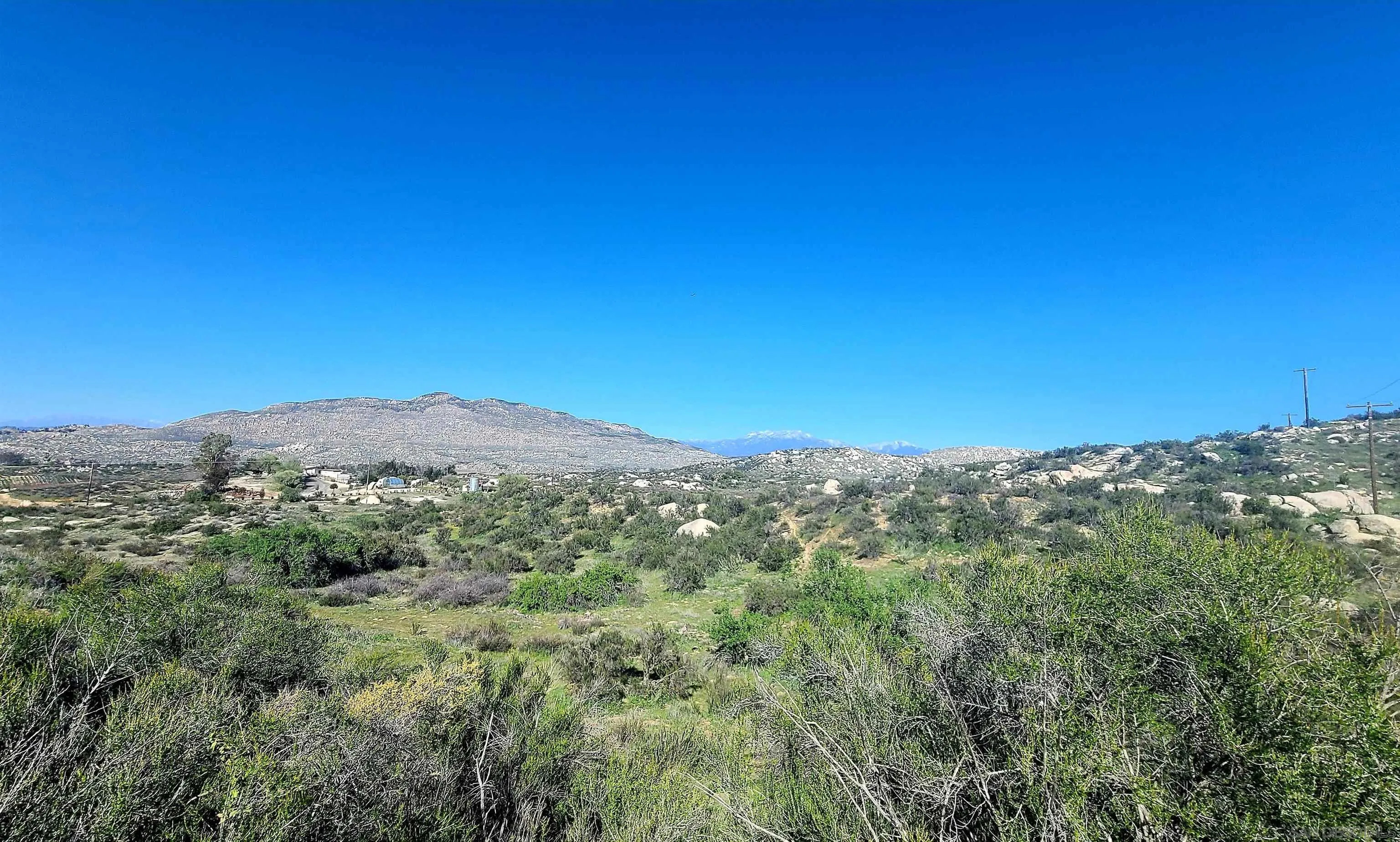 31732 Sage Road Hemet, CA 92544 - Photo 3 of 5 a view of a green field