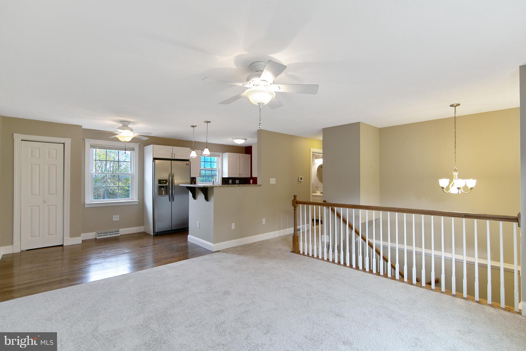 8306 Hollow Road Middletown, MD 21769 - Photo 2 of 37 a view of a livingroom with a furniture