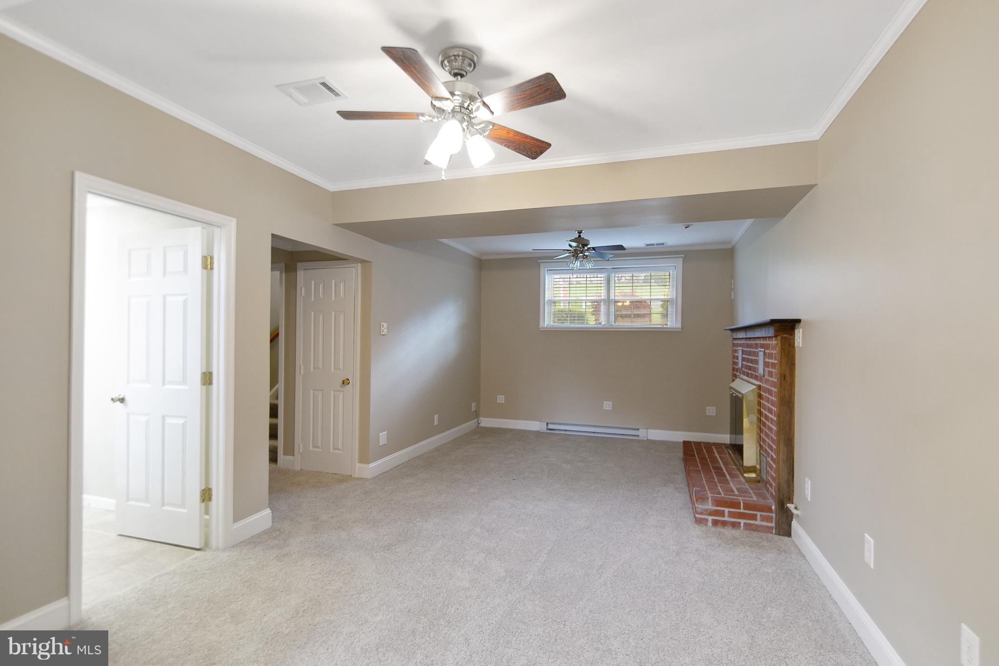 8306 Hollow Road Middletown, MD 21769 - Photo 12 of 37 a view of an empty room with a window