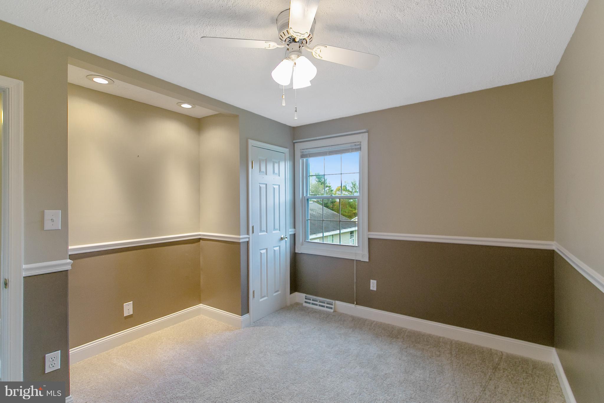 8306 Hollow Road Middletown, MD 21769 - Photo 16 of 37 a view of an empty room with a window