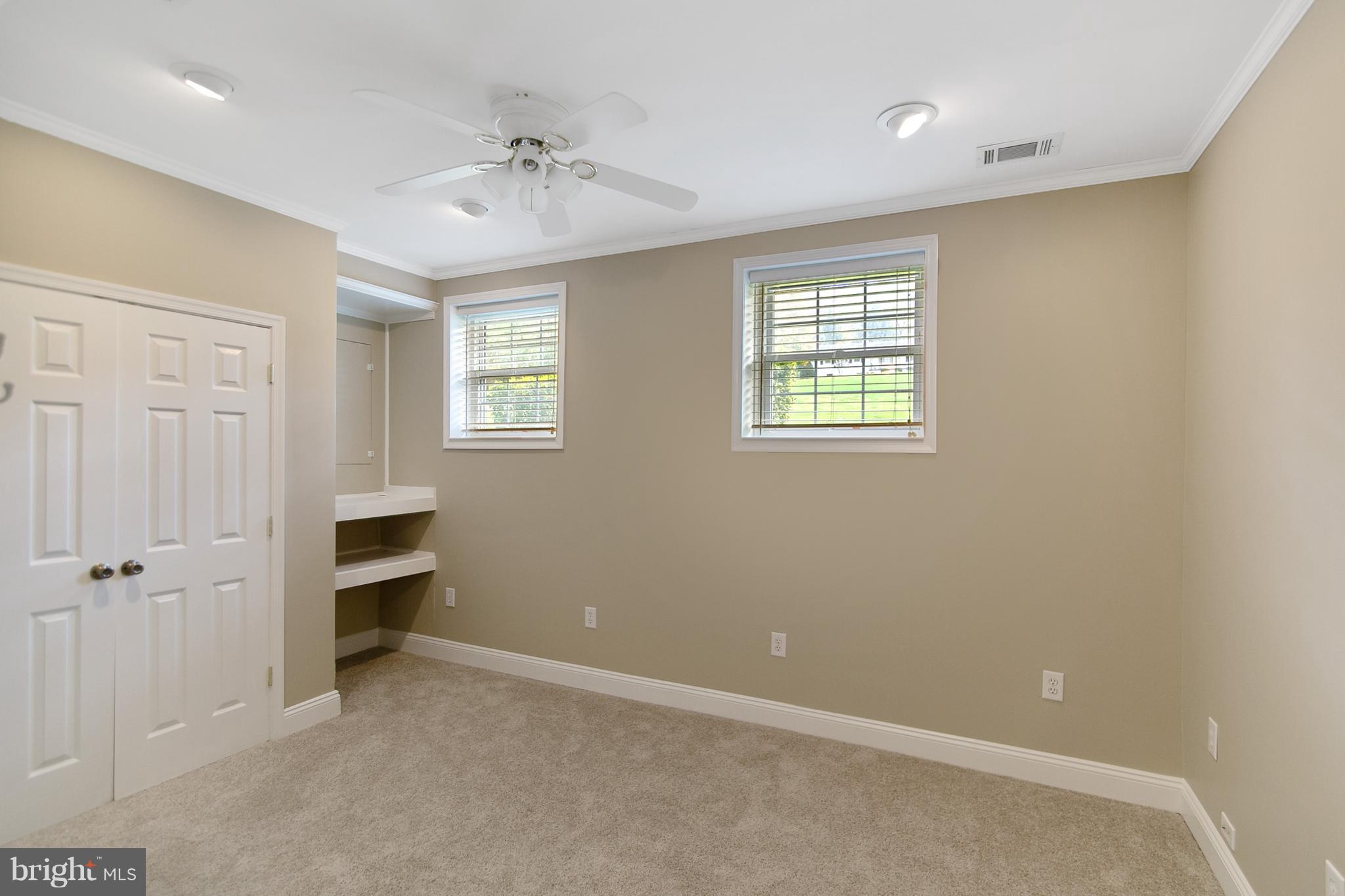 8306 Hollow Road Middletown, MD 21769 - Photo 17 of 37 a view of an empty room with a window