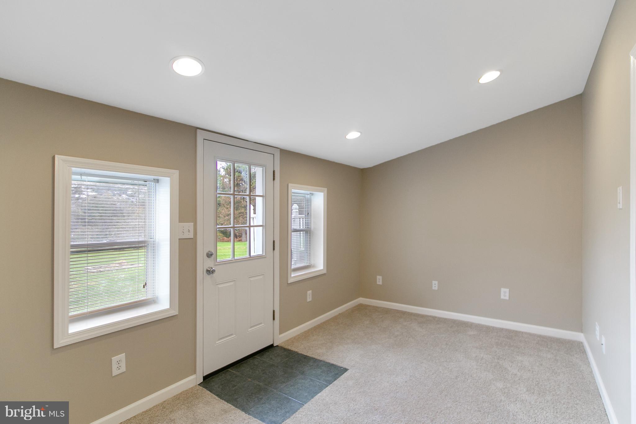 8306 Hollow Road Middletown, MD 21769 - Photo 20 of 37 an empty room with windows