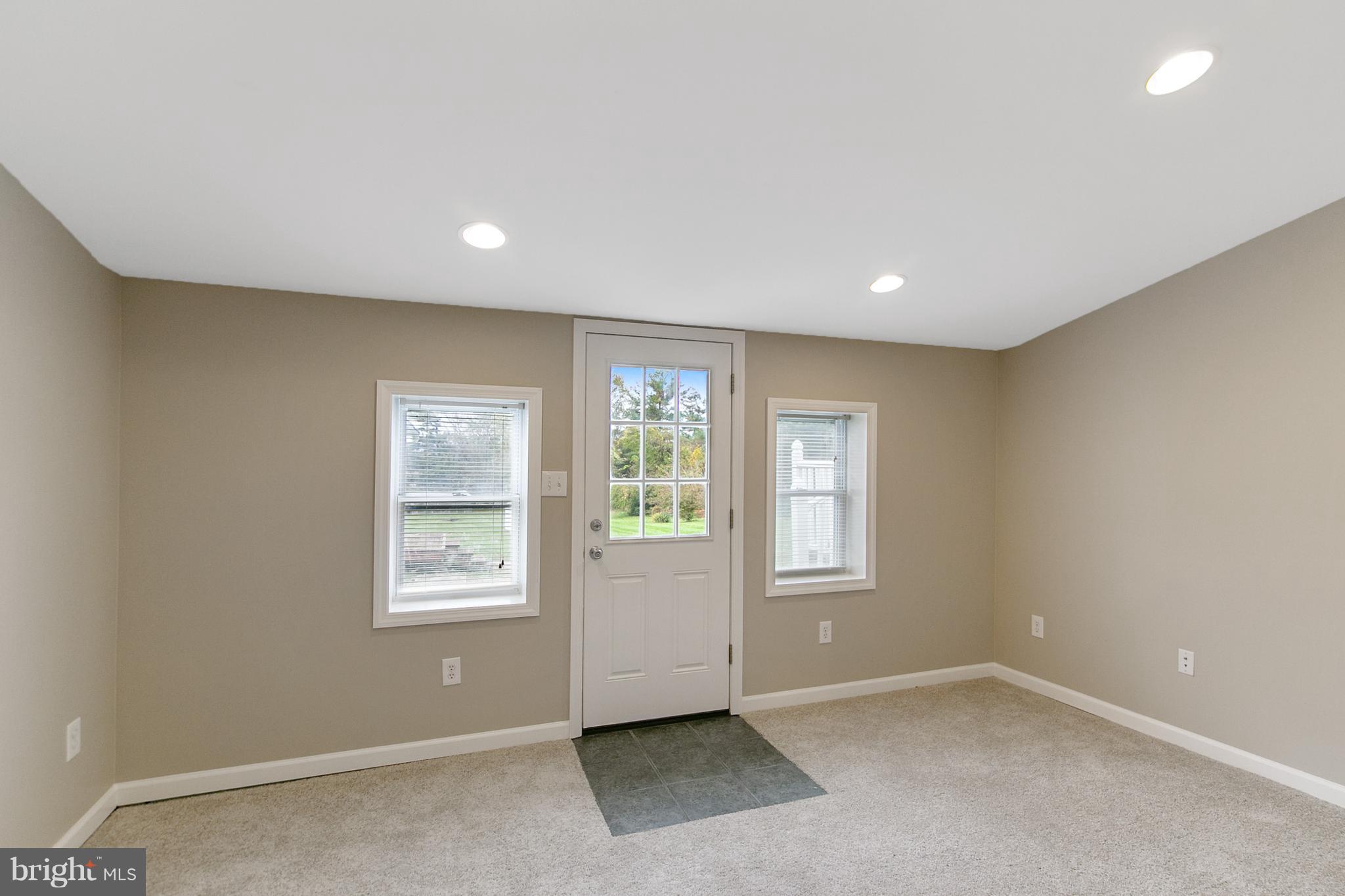 8306 Hollow Road Middletown, MD 21769 - Photo 21 of 37 an empty room with windows