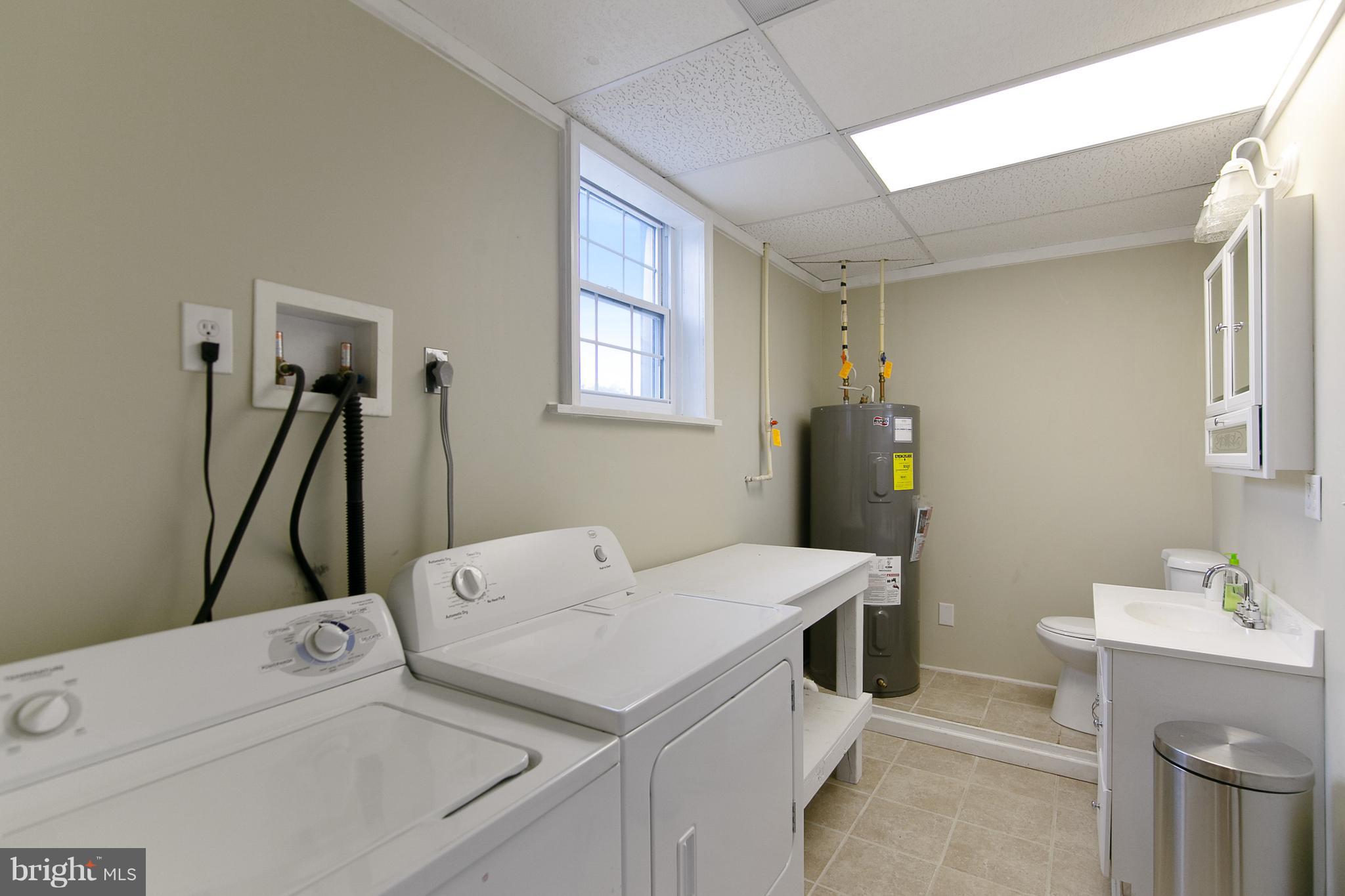 8306 Hollow Road Middletown, MD 21769 - Photo 24 of 37 a utility room with dryer and washer