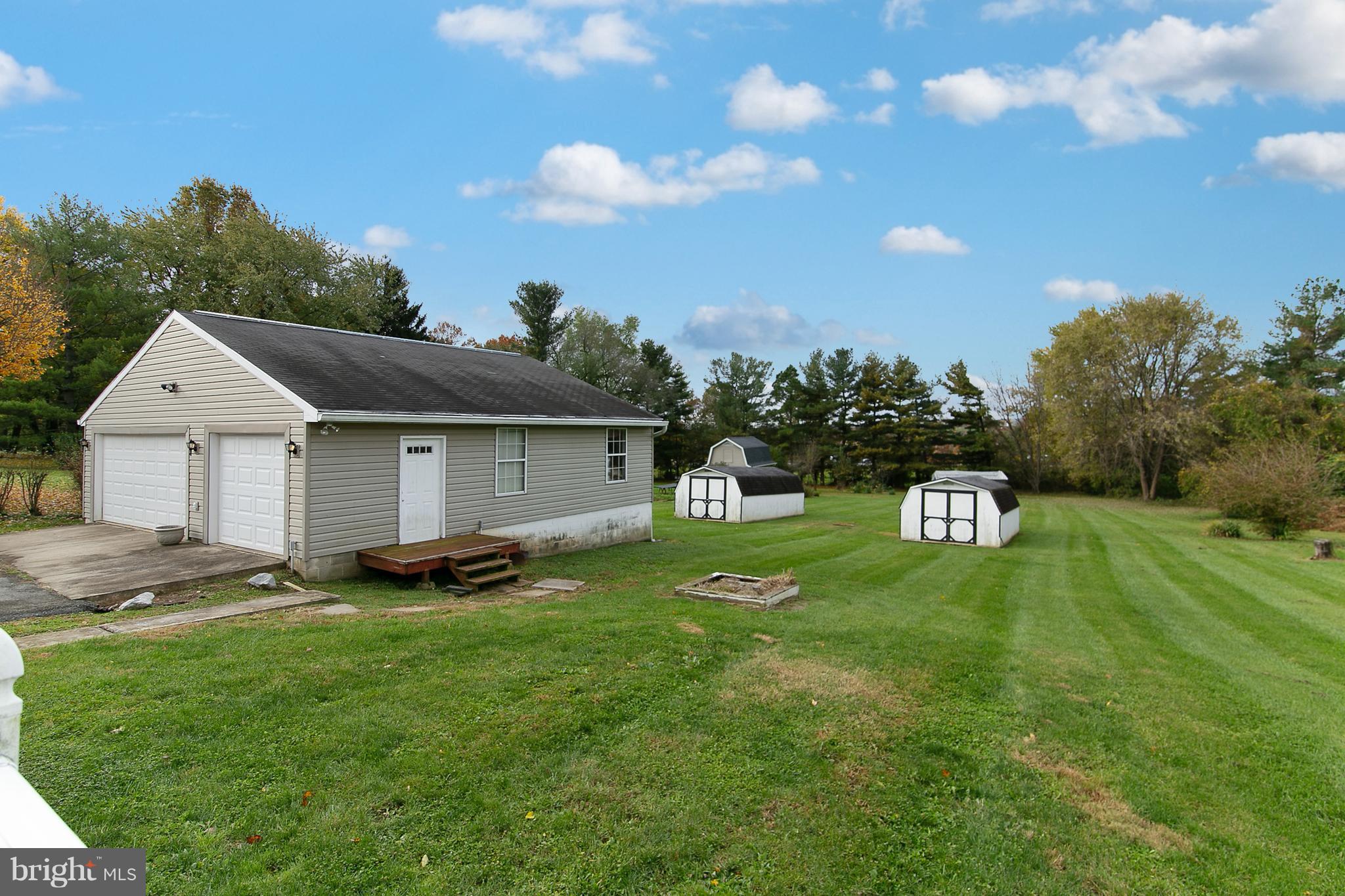 8306 Hollow Road Middletown, MD 21769 - Photo 28 of 37 a front view of a house with garden