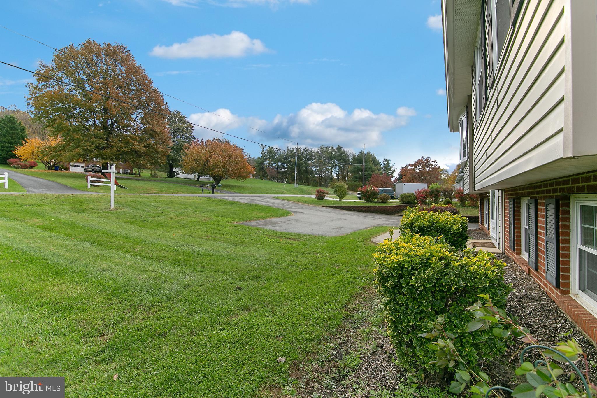 8306 Hollow Road Middletown, MD 21769 - Photo 29 of 37 a view of a park that has a lots of flower plants