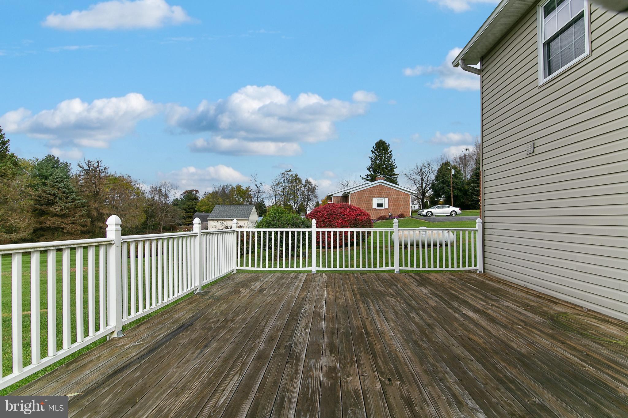 8306 Hollow Road Middletown, MD 21769 - Photo 31 of 37 a view of a deck with wooden floor and fence