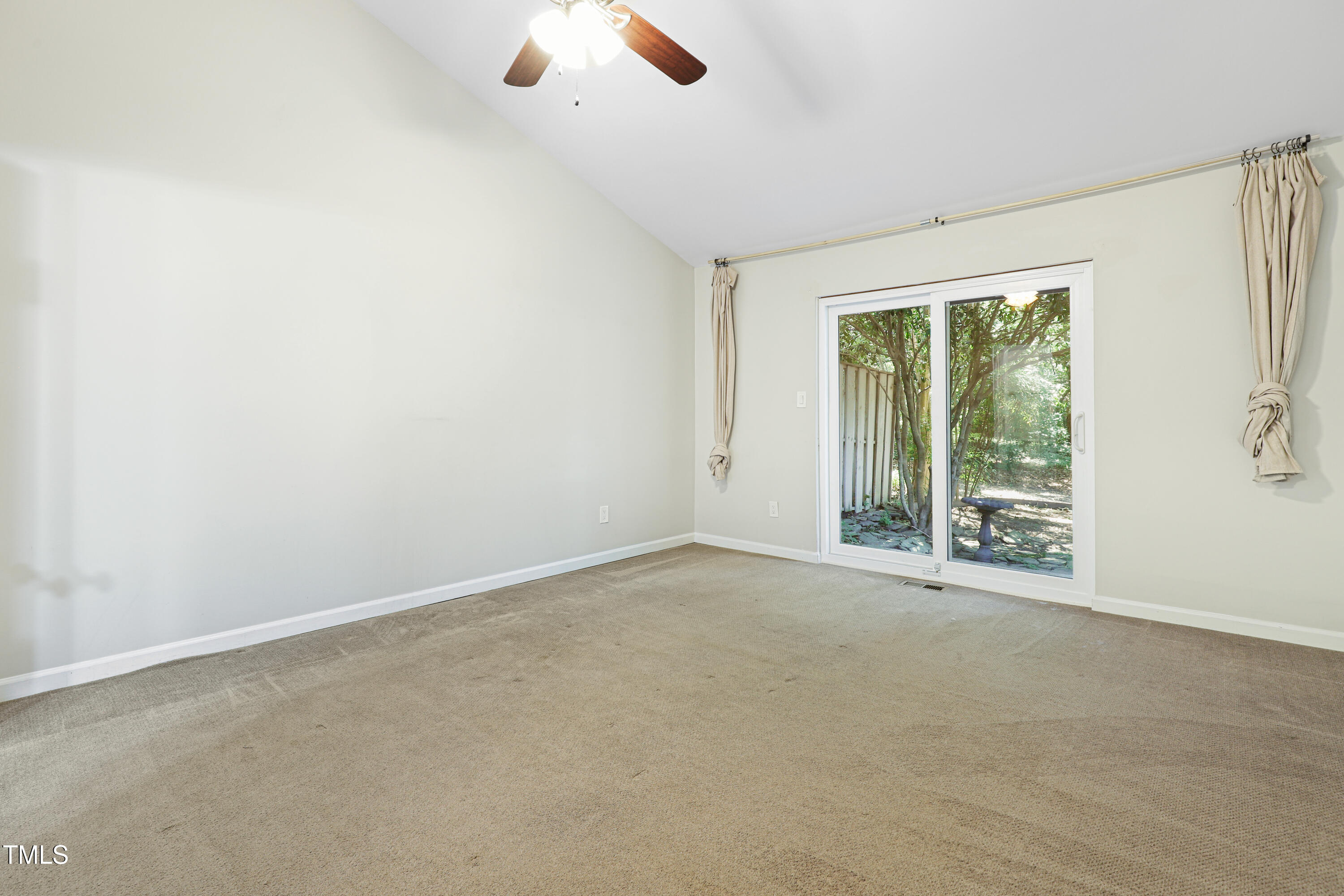 5840 Branchwood Road Raleigh, NC 27609 - Photo 14 of 33 an empty room with windows