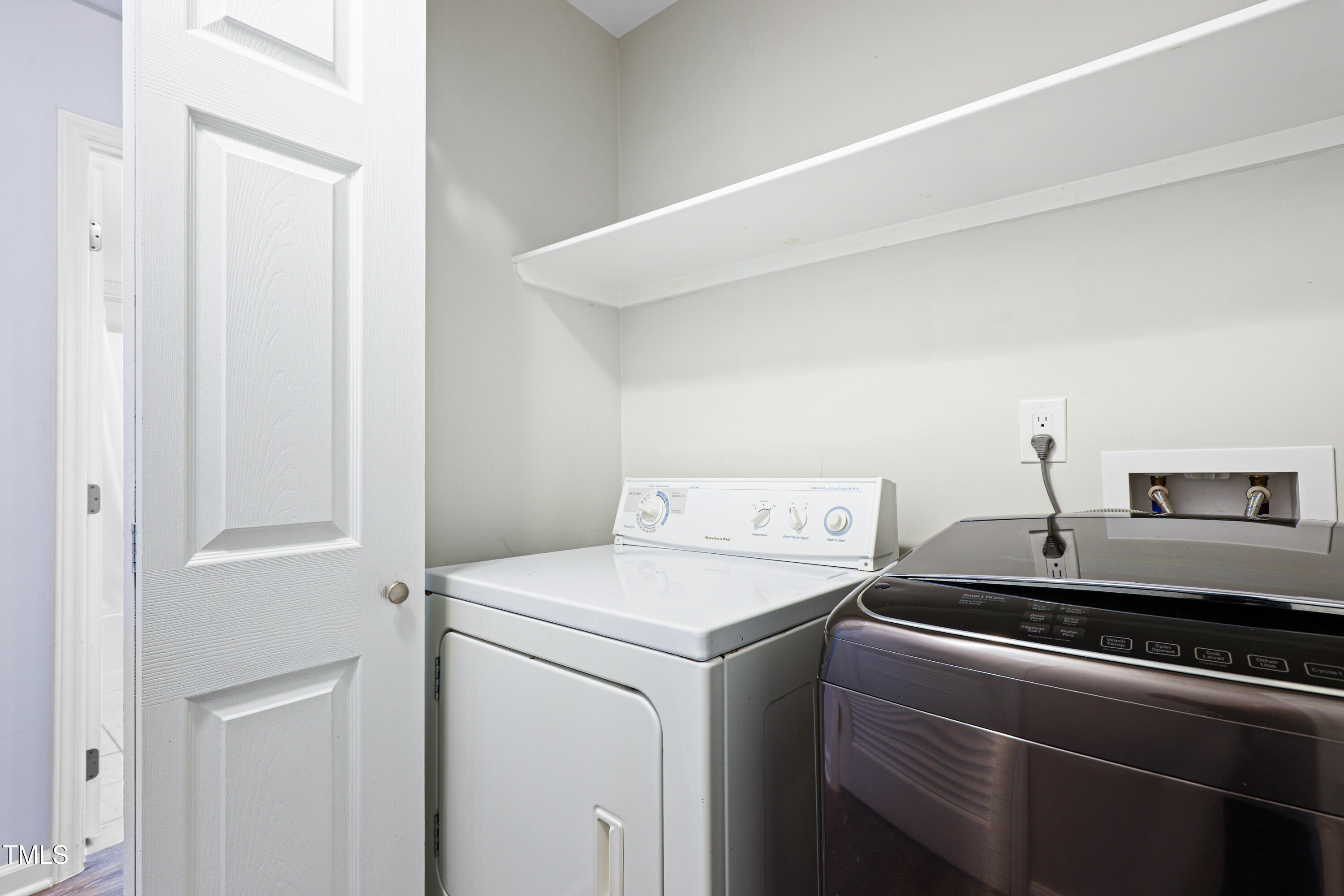 5840 Branchwood Road Raleigh, NC 27609 - Photo 21 of 33 a utility room with dryer and washer