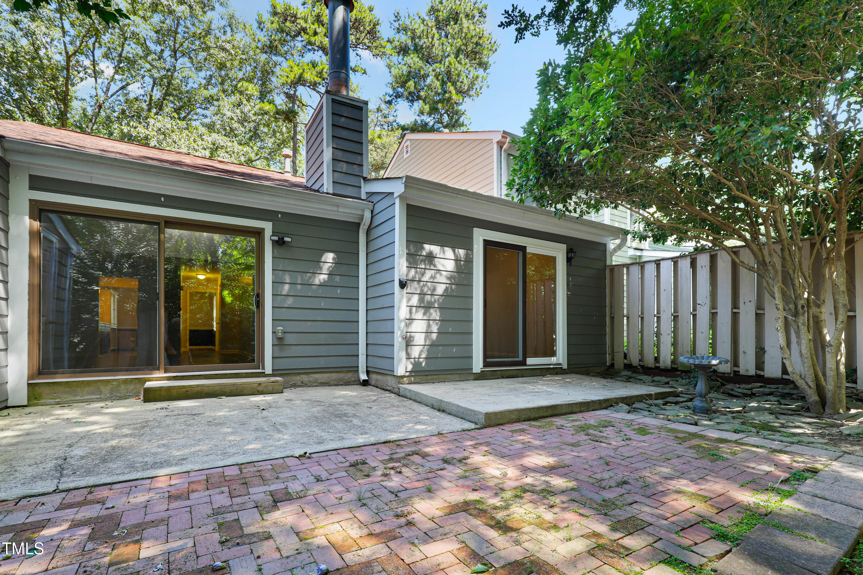 5840 Branchwood Road Raleigh, NC 27609 - Photo 25 of 33 a view of a house with a yard