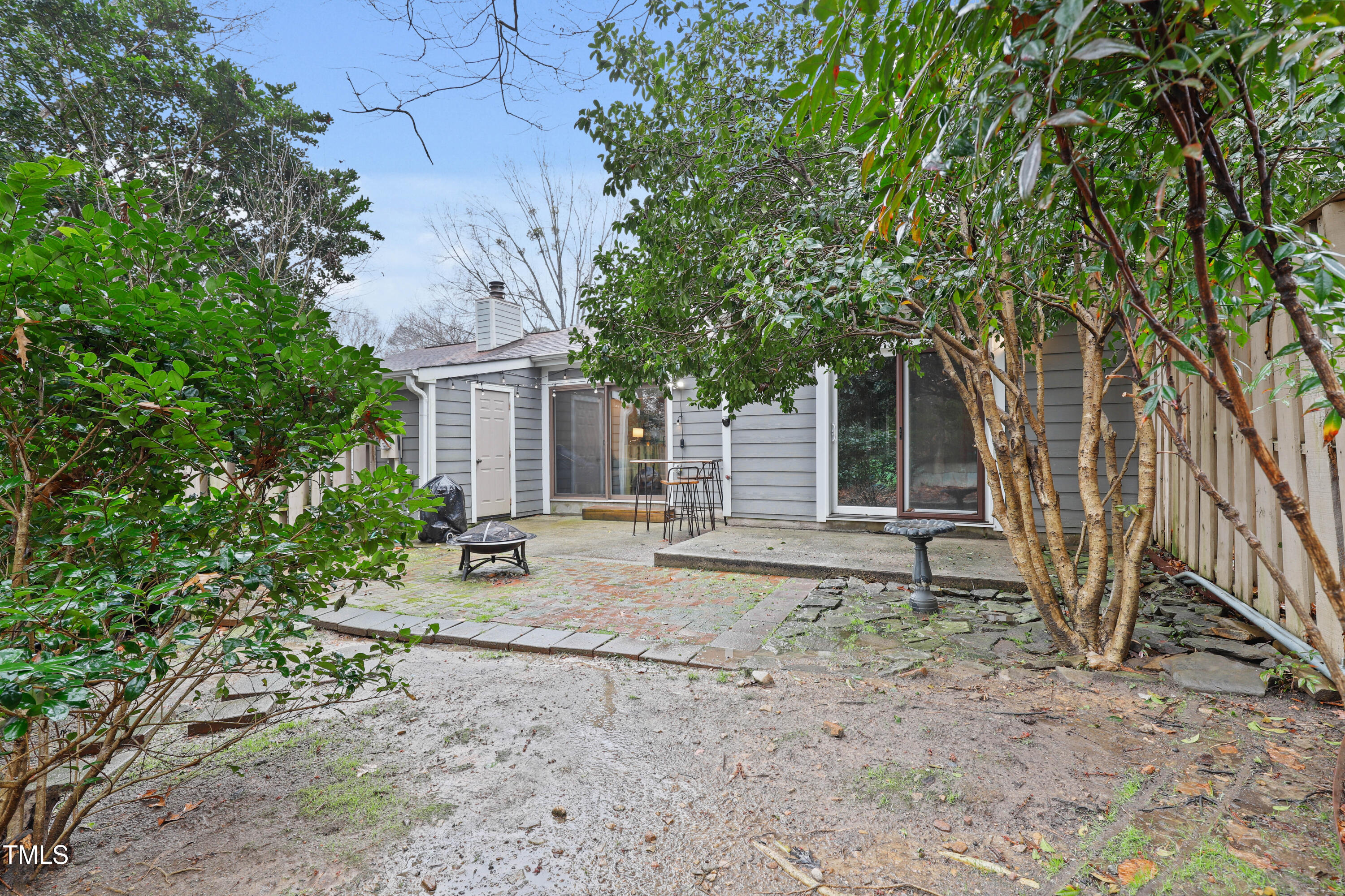 5840 Branchwood Road Raleigh, NC 27609 - Photo 26 of 33 a house with a tree in the background