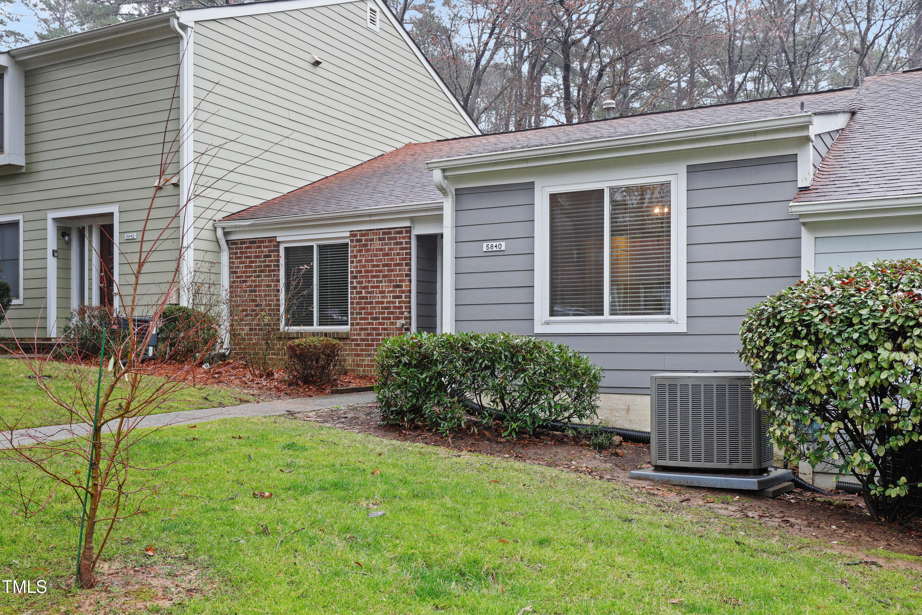 5840 Branchwood Road Raleigh, NC 27609 - Photo 27 of 33 a view of backyard with a garden and plants