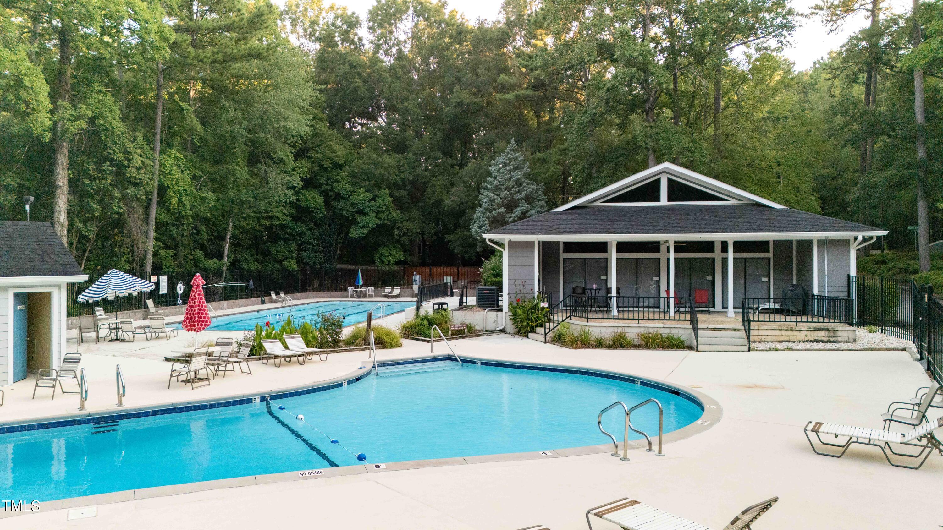 5840 Branchwood Road Raleigh, NC 27609 - Photo 29 of 33 a swimming pool view with a seating space