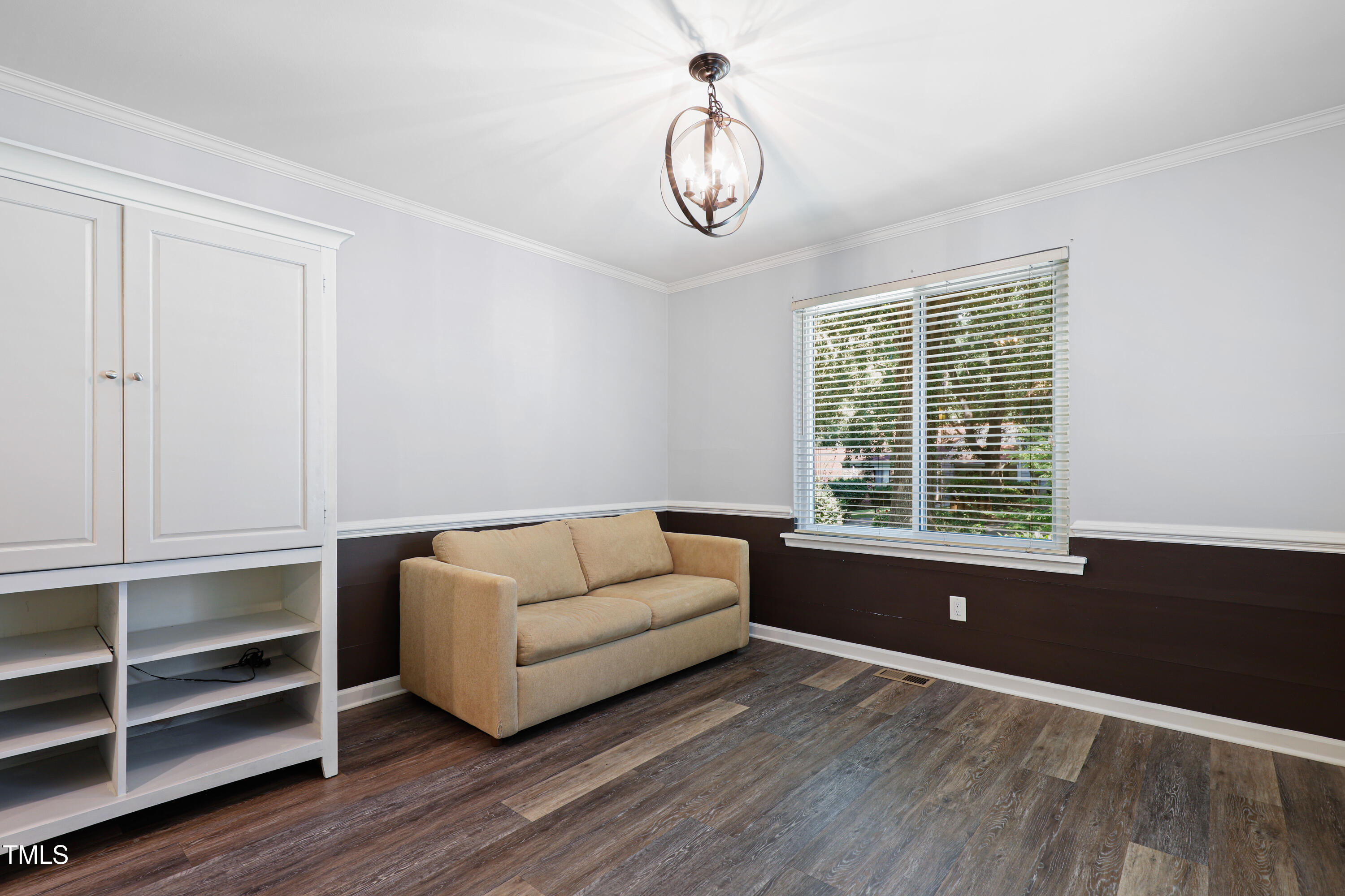 5840 Branchwood Road Raleigh, NC 27609 - Photo 3 of 33 a living room with furniture and a window