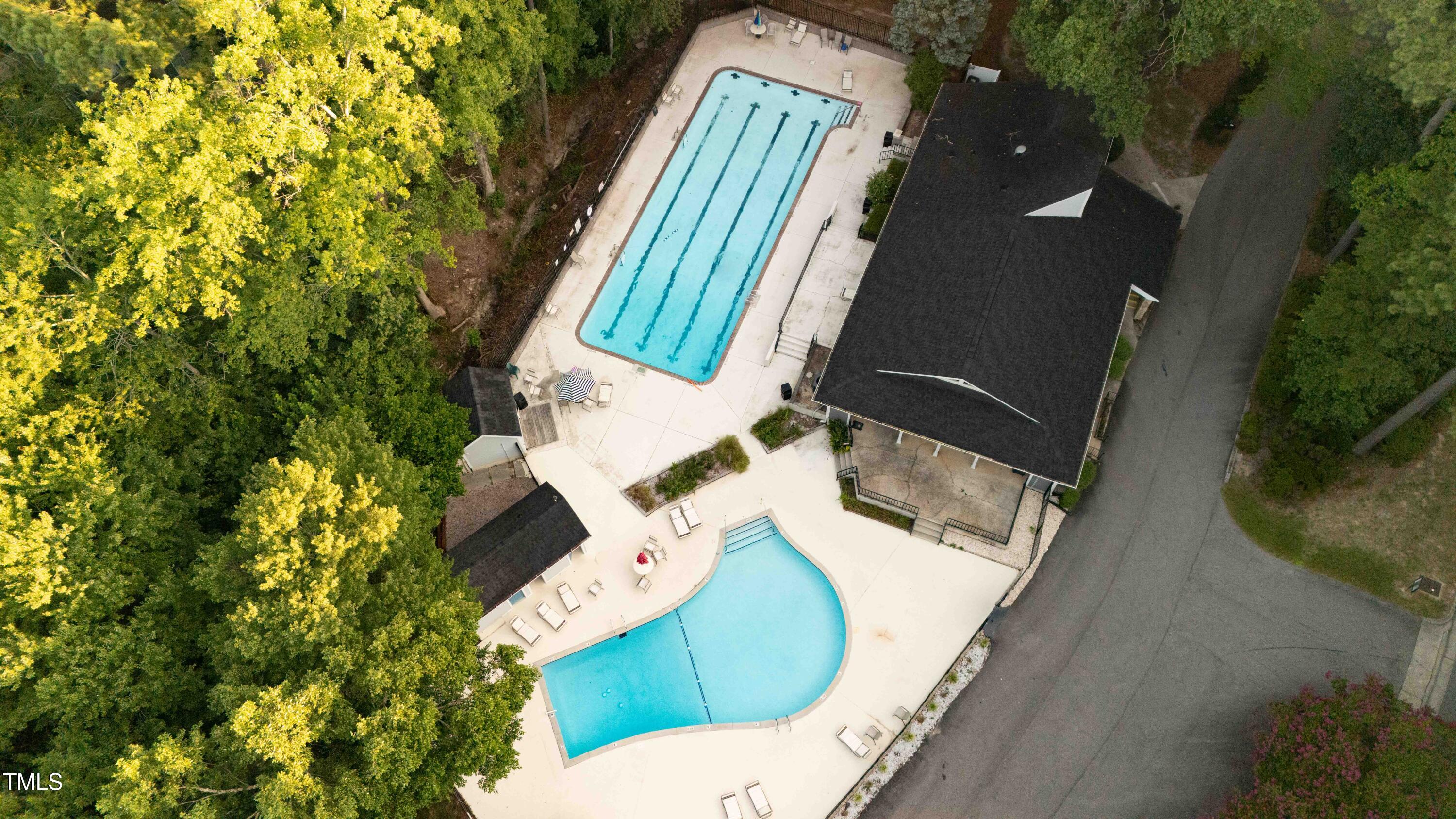 5840 Branchwood Road Raleigh, NC 27609 - Photo 31 of 33 an aerial view of a house with outdoor space