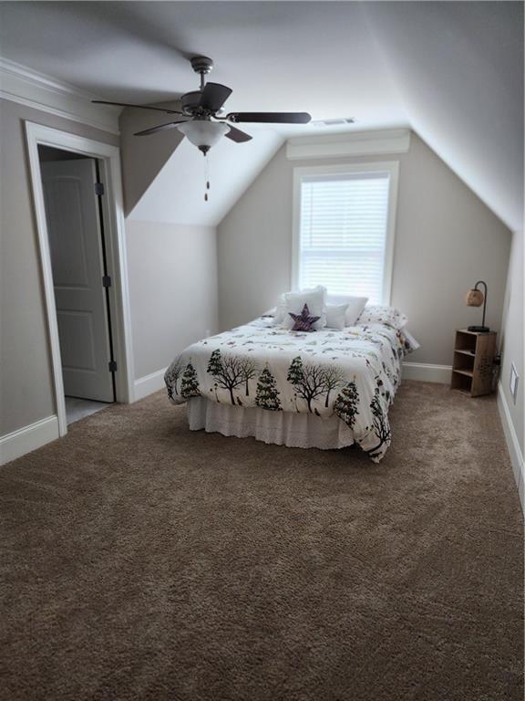194 Yorkshire Lane Villa Rica, GA 30180 - Photo 10 of 20 a spacious bedroom with a bed and a chandelier