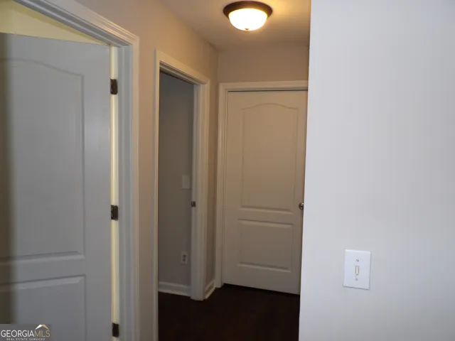 a view of a livingroom with wooden floor