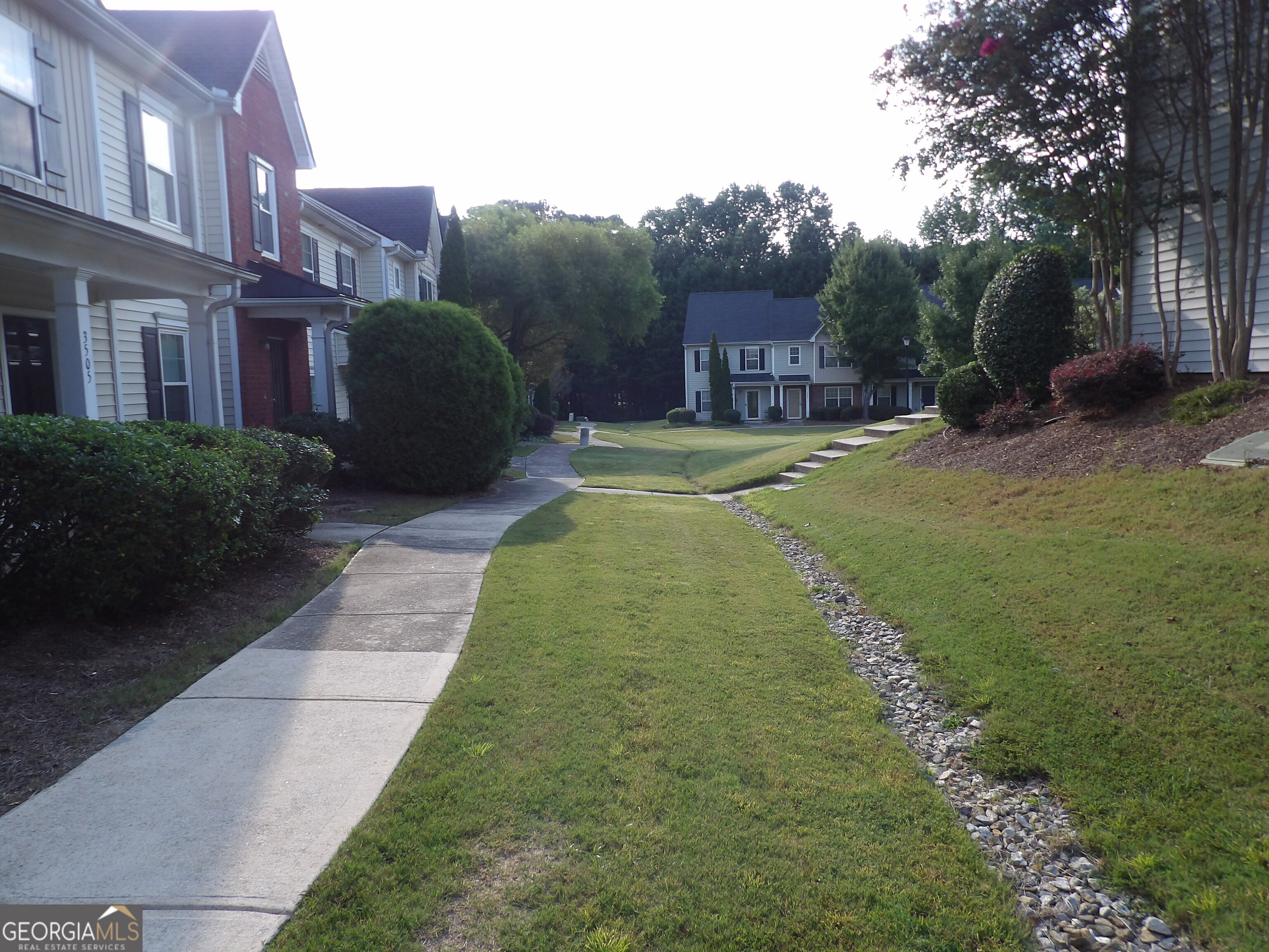 3503 Parc Circle Southwest Atlanta, GA 30311 - Photo 3 of 17 a swimming pool with outdoor seating and yard