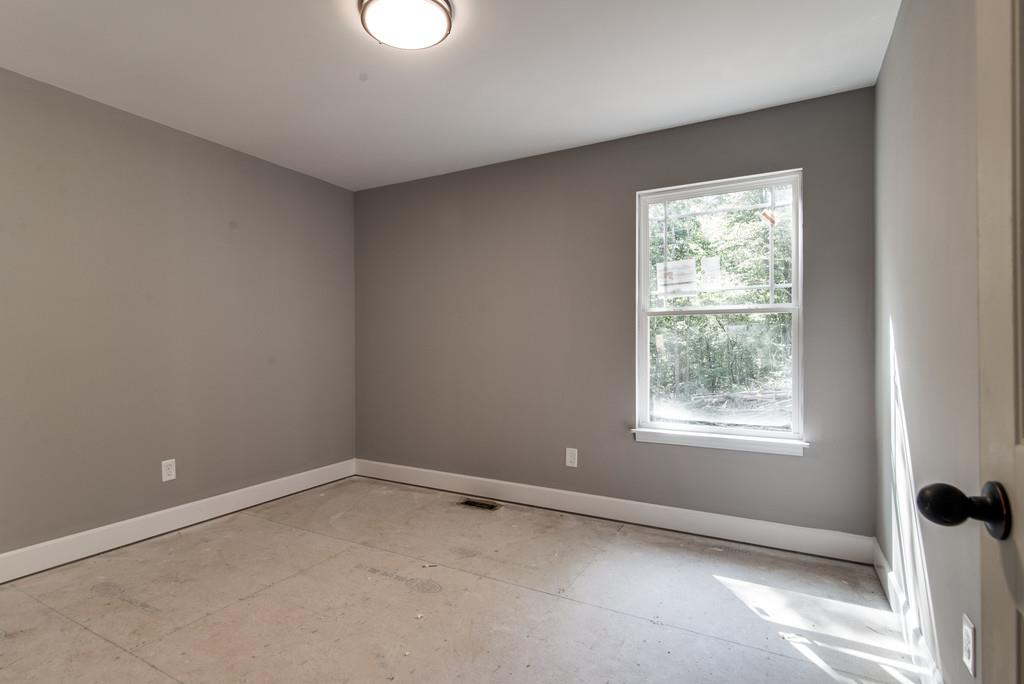 234 East Piney Road Dickson, TN 37055 - Photo 13 of 18 an empty room with a window
